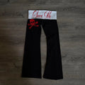 Scene Women's Black Wide-Leg Skull-and-Crossbones Graphic Pants