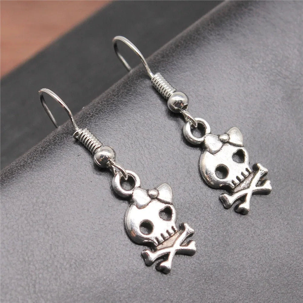 Scene Antique Silver Skull and Bow Drop Earrings
