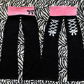 Scene Women's Black and Pink Skull Print Wide-Leg Pants